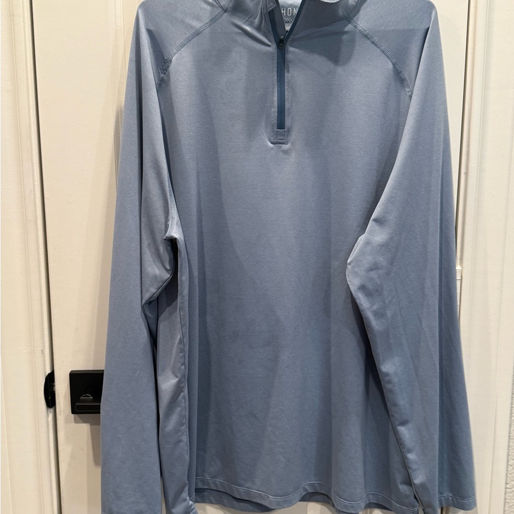 Rhone men’s commuter pullover shirt.